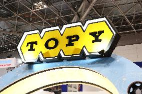 Topy Industries signage and logo